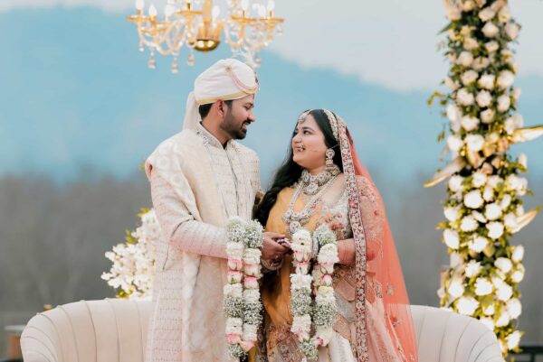 Capturing a beautiful moment at a wedding in jim corbett, showcasing love and celebration.